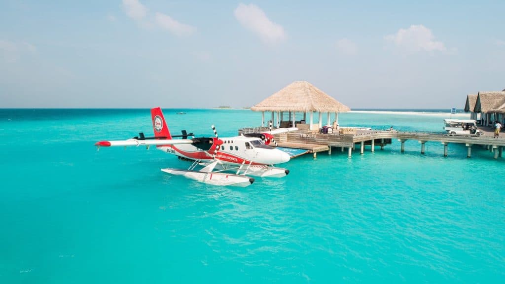 Transmaldivian Seaplane. Flying across atolls with a seaplane in the Maldives.